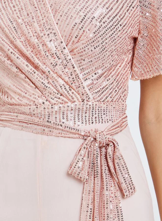 ستايلي جمبسوت لف مزين بالترتر